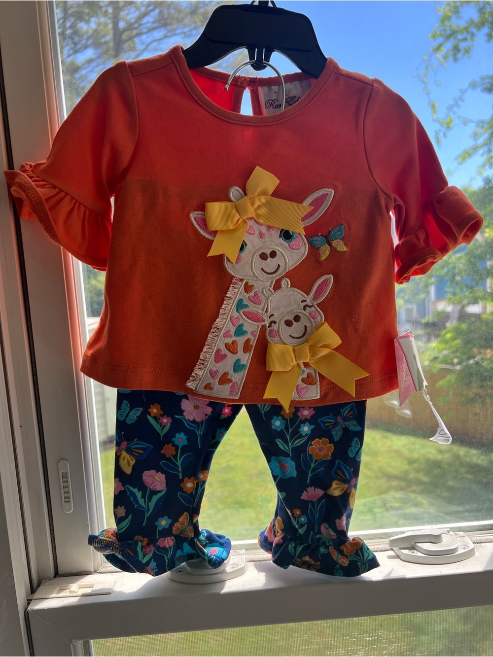 Little Girls Orange Giraffe Applique Top with Floral Leggings
